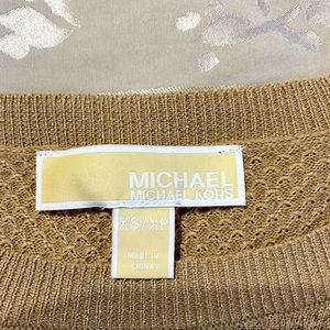 Micheal Korda sweater size small. Belled sleeves